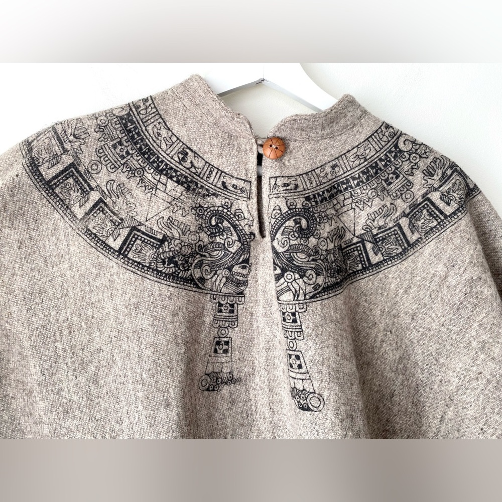 Fringed hem poncho with Egyptian-look print around collar - Picture 6 of 13